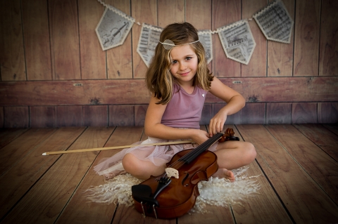 fotografia niña con violin