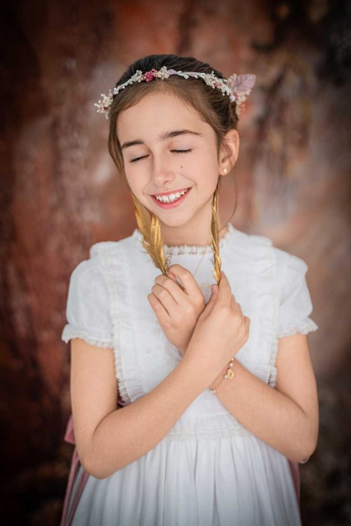niña comunion dos hermanas